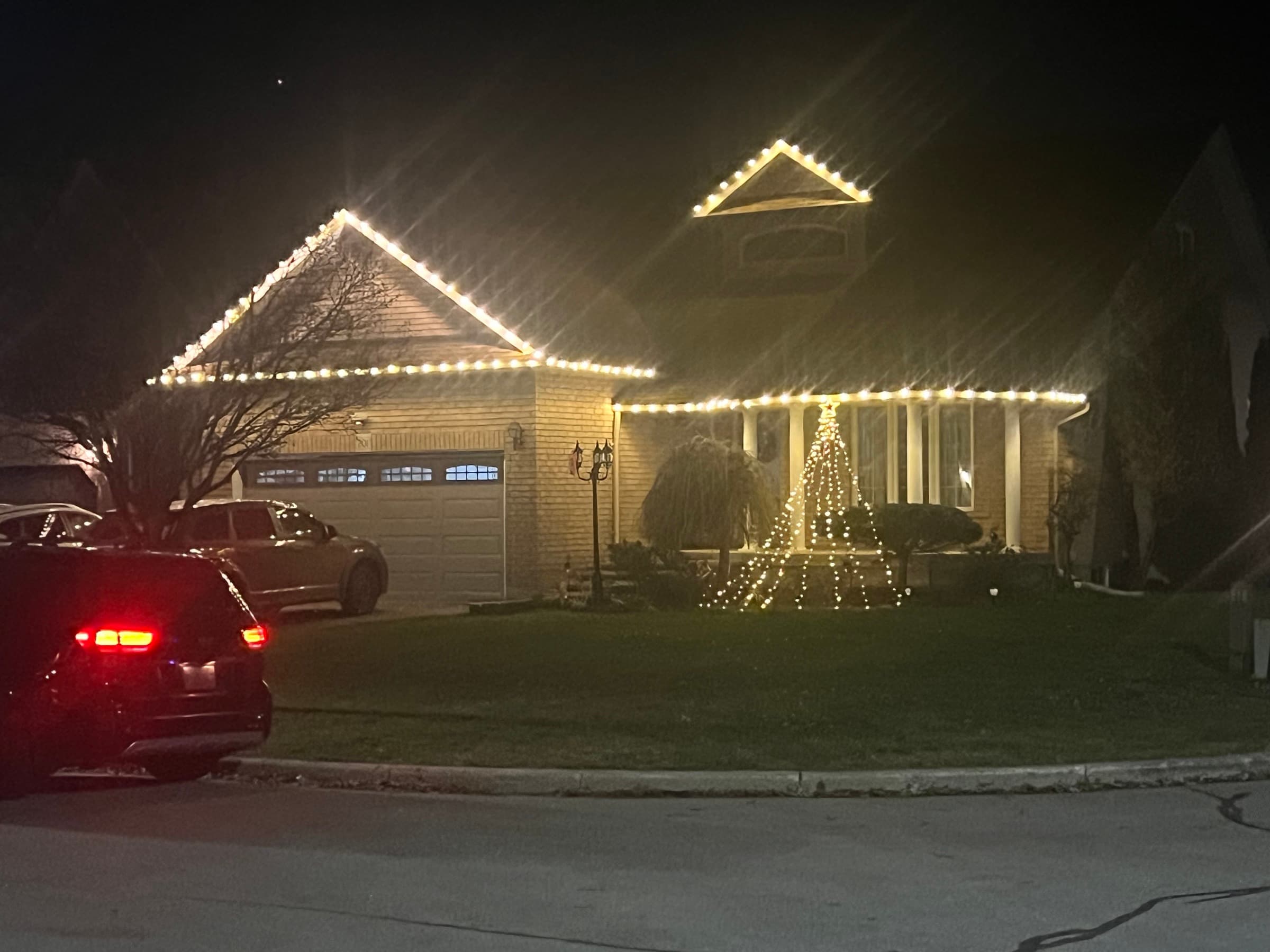 Professional Christmas light installation on a residential home in Durham Region, Ontario